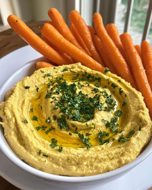 Bastones de zanahoria con hummus